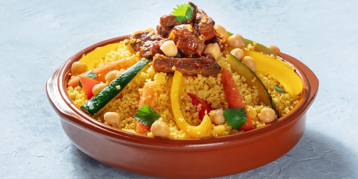Meat and vegetable couscous in a bowl, typical food from Morocco