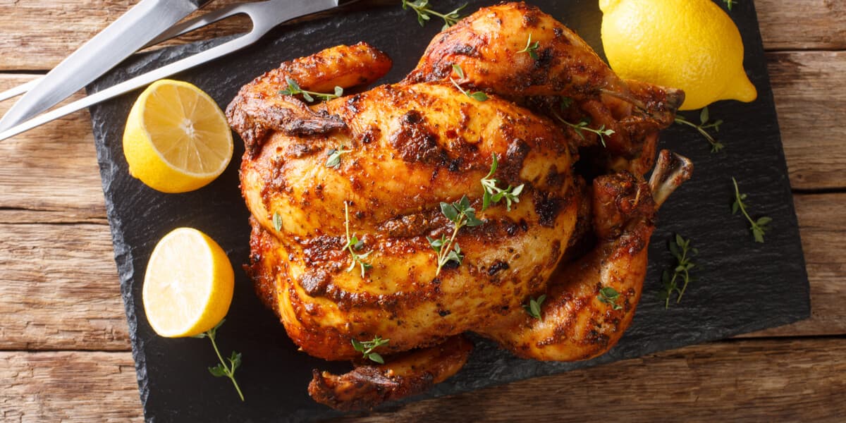 Roast chicken on a cutting board